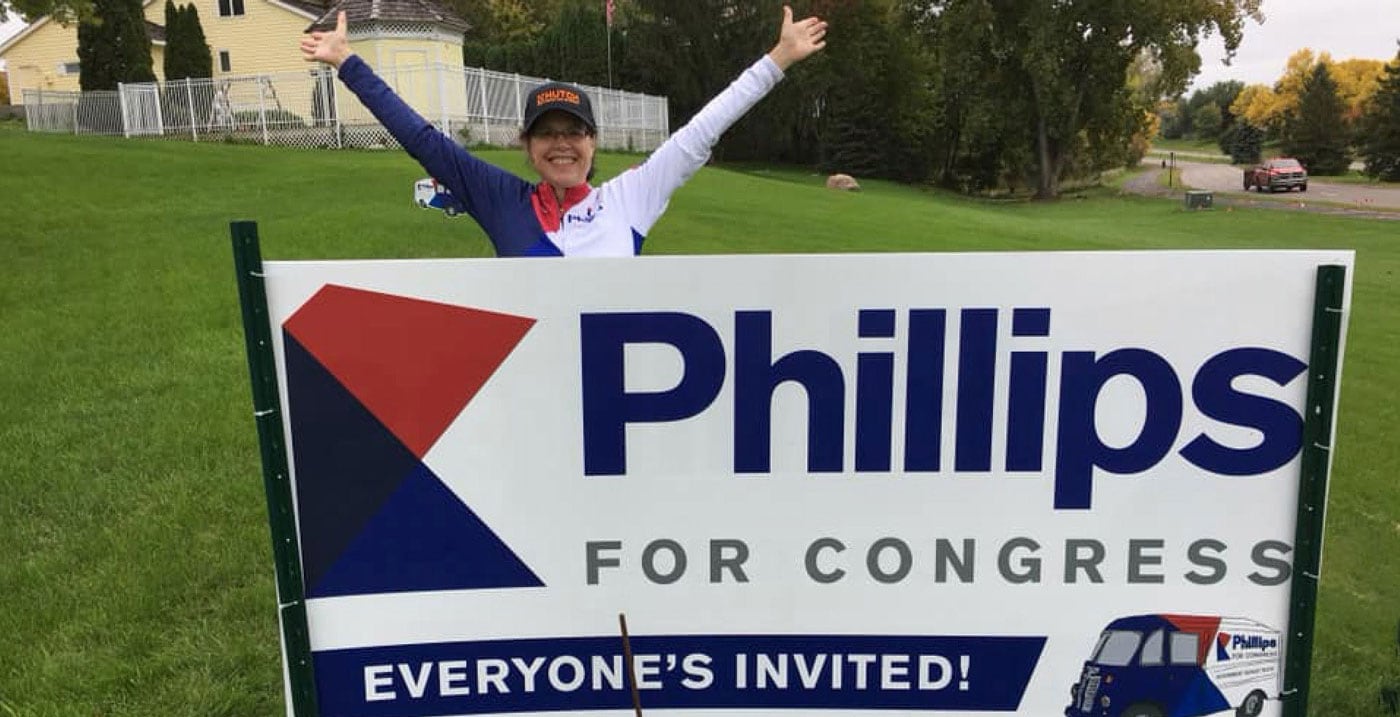 Dean Phillips supporter posting her yard sign