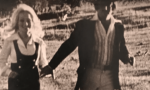 DeeDee walks with Eddie Phillips. DeeDee and Eddie Phillips