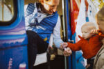 Dean interacts with a young boy at the Phillips Government Repair Truck. Dean interacts with a young boy at the Phillips Government Repair Truck.