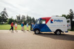 People gather at the Phillips Government Repair Truck. People gather at the Phillips Government Repair Truck.