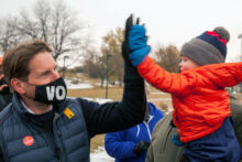 Dean high fives little boy