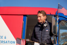 Dean speaking at a GOTV rally