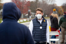 Dean listening to a voter