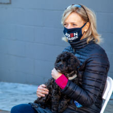 Volunteer with puppy